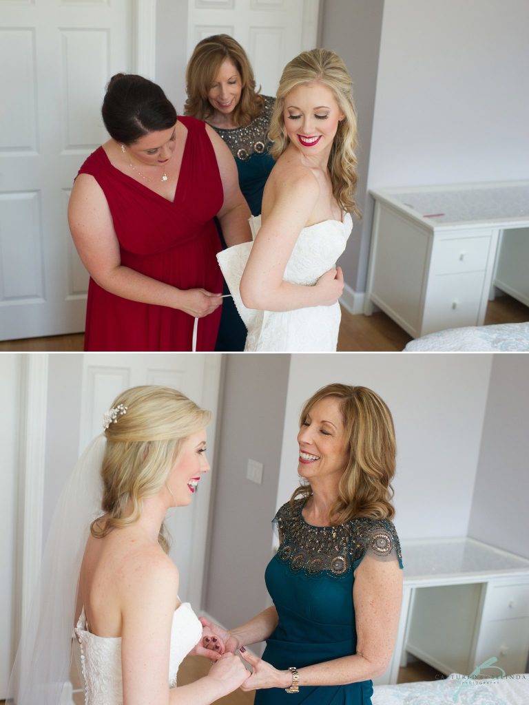 bride getting into her dress 